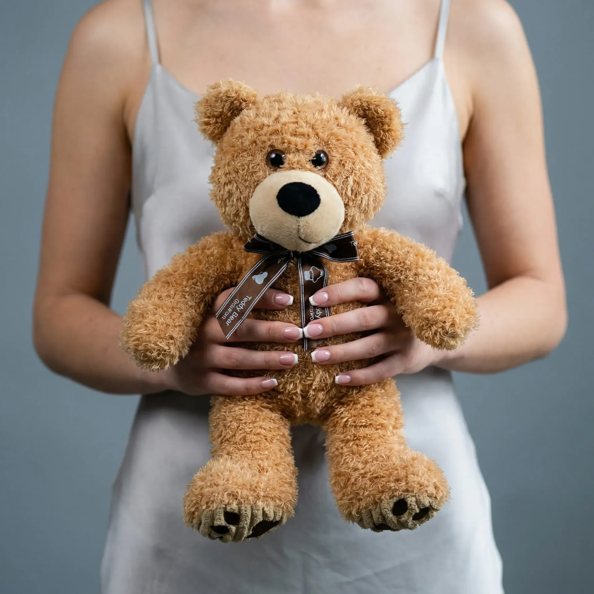 Plush toy "Teddy Bear" caramel with bow